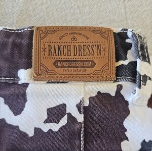 Ranch Dress'n cow print flares